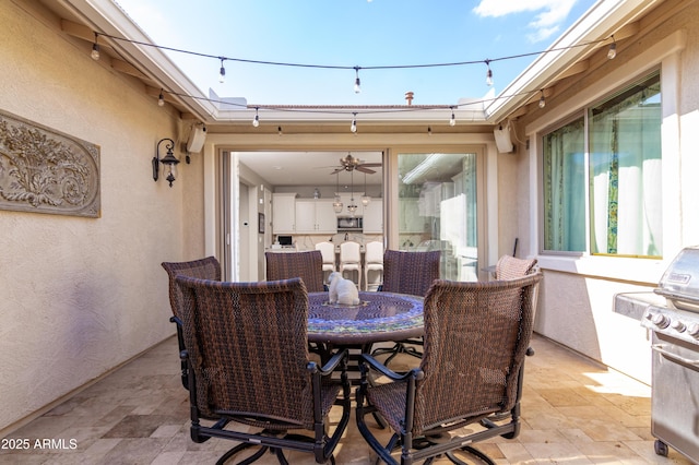 view of patio / terrace with a grill