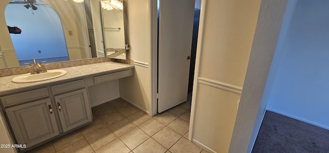 bathroom featuring tile patterned floors and vanity