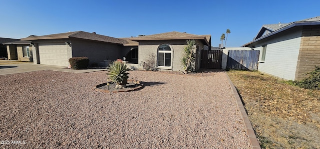 single story home featuring a garage