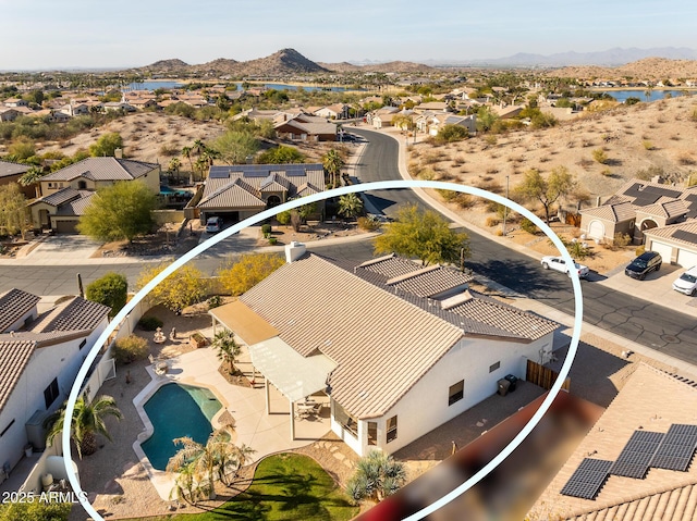 aerial view featuring a residential view and a mountain view