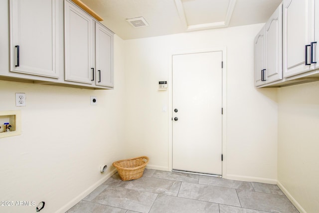 laundry area with cabinets, hookup for an electric dryer, hookup for a washing machine, and light tile patterned floors