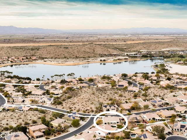 aerial view featuring a residential view and a water and mountain view