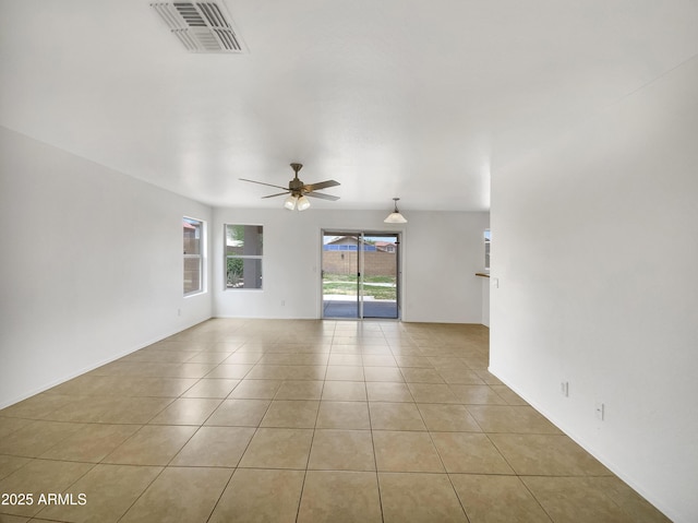 1078 E Poncho Ln, San Tan Valley, AZ 85143 - empty room featuring ceiling fan and light tile patterned floors