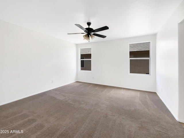 1078 E Poncho Ln, San Tan Valley, AZ 85143 - carpeted spare room featuring a ceiling fan and baseboards