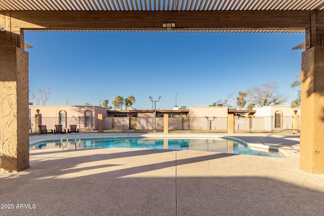 view of pool featuring a pergola and a patio