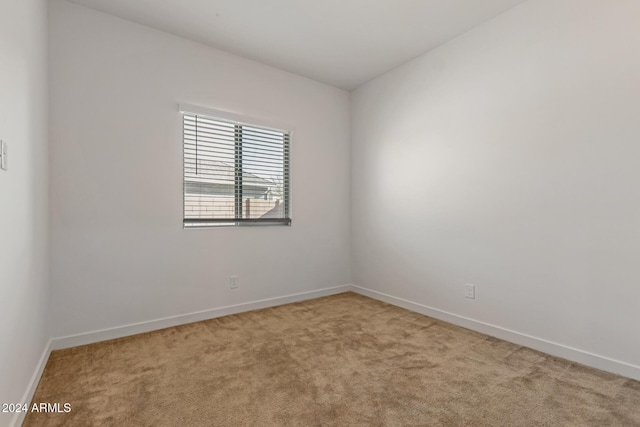 spare room with carpet flooring