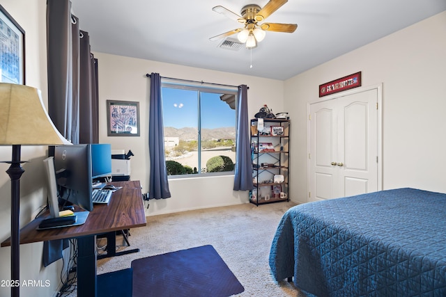 bedroom with visible vents, ceiling fan, carpet floors, and baseboards