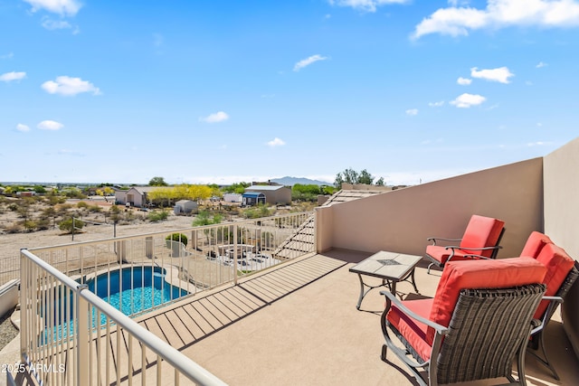exterior space featuring a mountain view and a fenced in pool