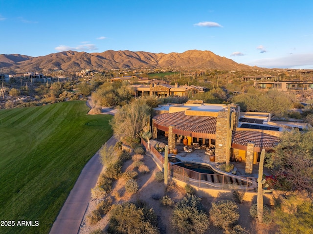 birds eye view of property featuring a mountain view