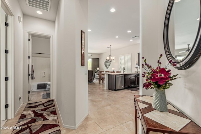1813 N Trowbridge, Mesa, AZ 85207 - corridor featuring visible vents, recessed lighting, a notable chandelier, and a sink