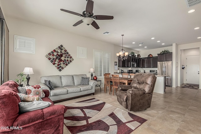 1813 N Trowbridge, Mesa, AZ 85207 - living area featuring recessed lighting, visible vents, and ceiling fan with notable chandelier