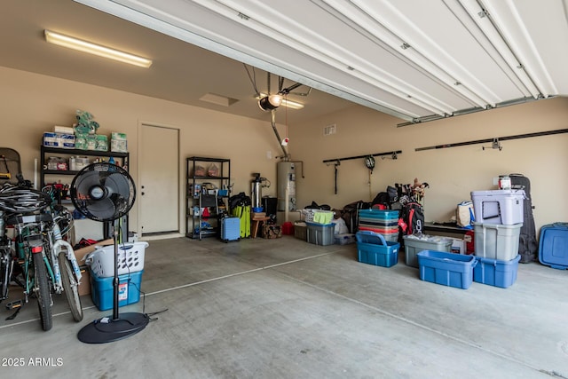 1813 N Trowbridge, Mesa, AZ 85207 - garage featuring water heater and a garage door opener