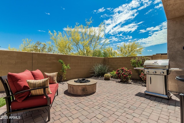 1813 N Trowbridge, Mesa, AZ 85207 - view of patio / terrace with a fire pit, a fenced backyard, and a grill