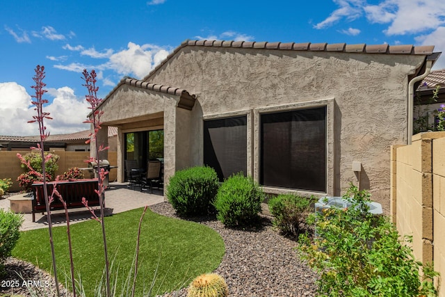 1813 N Trowbridge, Mesa, AZ 85207 - rear view of property featuring stucco siding, fence, and a patio