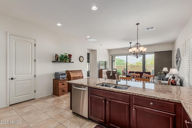 1813 N Trowbridge, Mesa, AZ 85207 - kitchen with light stone counters, an inviting chandelier, visible vents, stainless steel dishwasher, and a sink