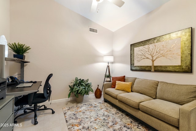 office area featuring visible vents, a ceiling fan, baseboards, and vaulted ceiling