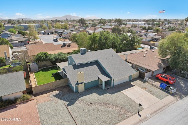 bird's eye view featuring a mountain view and a residential view