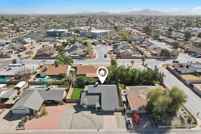 drone / aerial view with a mountain view and a residential view