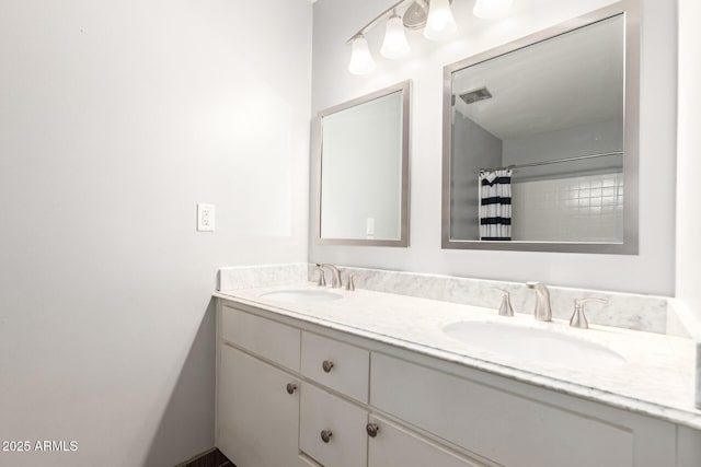 full bathroom with double vanity, visible vents, a shower with curtain, and a sink