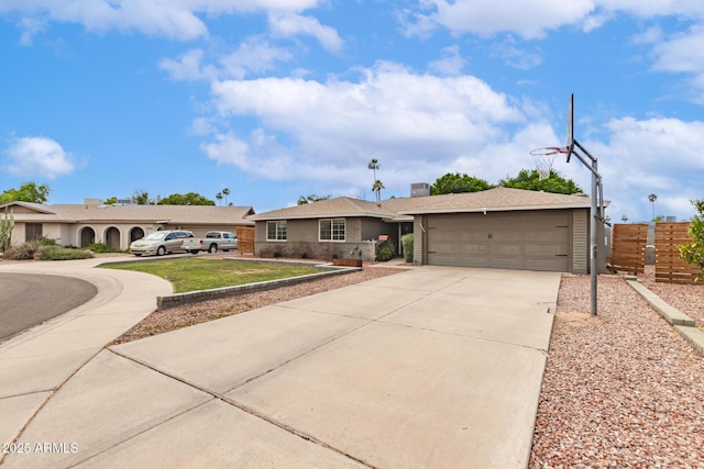 ranch-style house with fence, an attached garage, brick siding, concrete driveway, and a front lawn