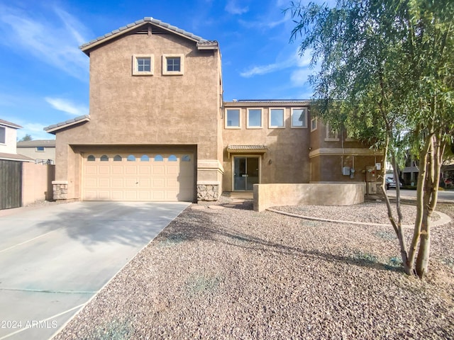 view of front of home with a garage