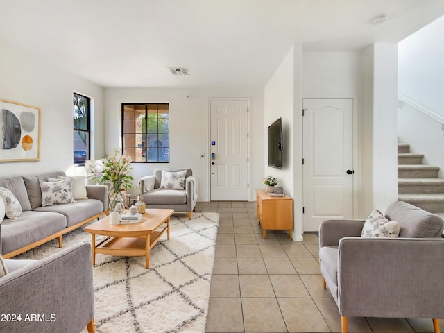 living room with light tile patterned floors