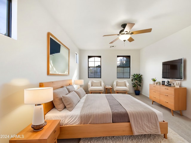 carpeted bedroom featuring ceiling fan