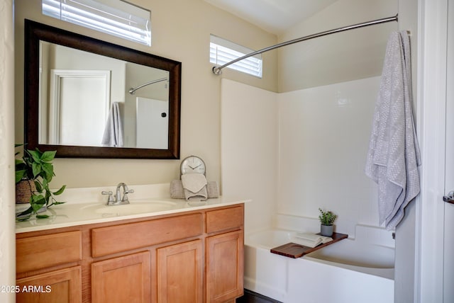 bathroom with shower / bath combination and vanity