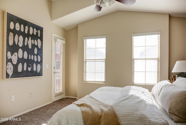 carpeted bedroom with ceiling fan and lofted ceiling