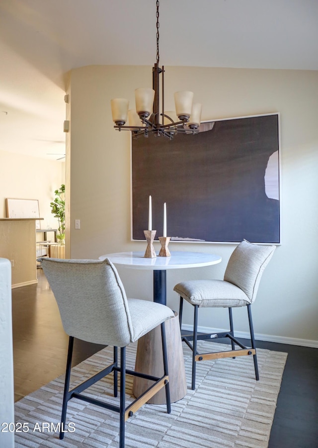 dining room featuring a notable chandelier