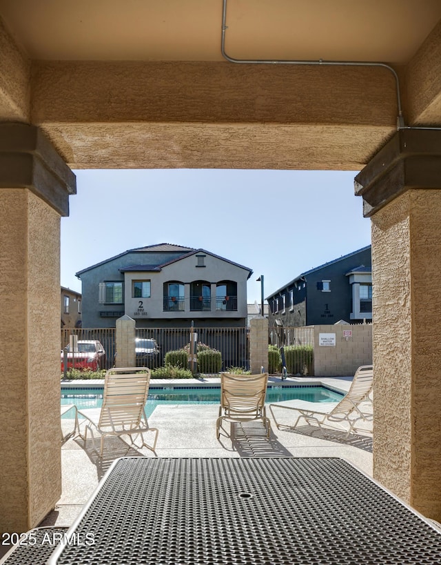 view of swimming pool with a patio area