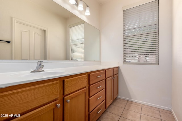 3756 E Kerry Ln, Phoenix, AZ 85050 - bathroom with vanity, tile patterned floors, and baseboards
