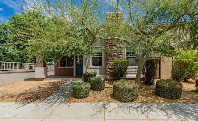 3756 E Kerry Ln, Phoenix, AZ 85050 - view of property hidden behind natural elements with covered porch