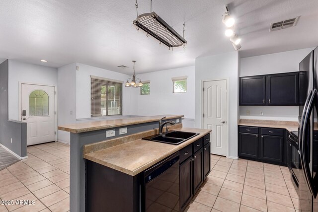 3756 E Kerry Ln, Phoenix, AZ 85050 - kitchen with black dishwasher, a sink, light tile patterned floors, a chandelier, and recessed lighting