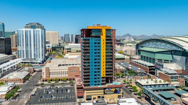 property's view of city with a mountain view