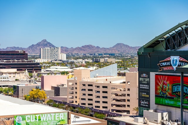 view of mountain feature with a view of city