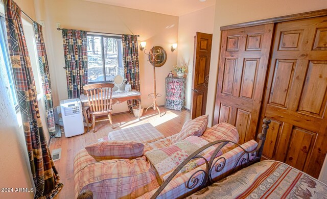 2353 Florian Meadow Trl, Overgaard, AZ 85933 - bedroom featuring visible vents and wood finished floors