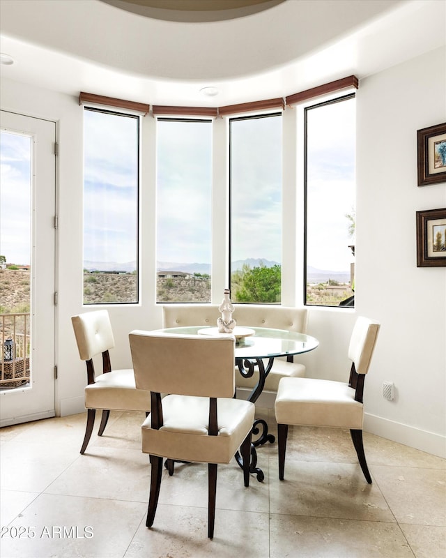 15816 E Eagle Crest Rd, Fountain Hills, AZ 85268 - dining space with light tile patterned floors and baseboards