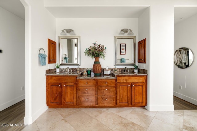 15816 E Eagle Crest Rd, Fountain Hills, AZ 85268 - bathroom featuring double vanity, baseboards, and tile patterned flooring