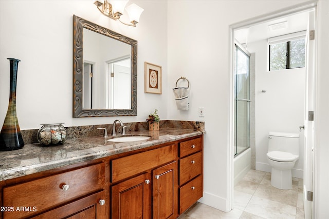 15816 E Eagle Crest Rd, Fountain Hills, AZ 85268 - bathroom featuring vanity, toilet, bath / shower combo with glass door, and baseboards