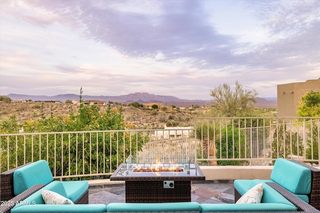 15816 E Eagle Crest Rd, Fountain Hills, AZ 85268 - view of patio / terrace with an outdoor living space with a fire pit and a mountain view
