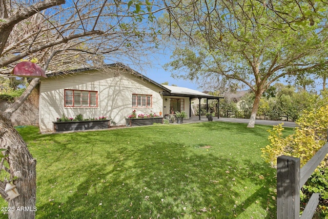 view of front of house with a front lawn