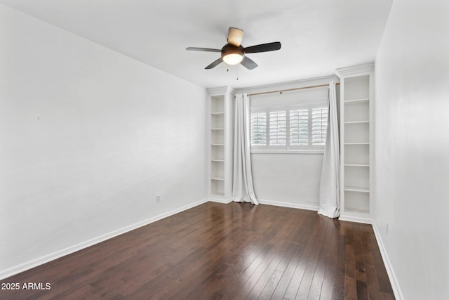 unfurnished bedroom featuring ceiling fan, hardwood / wood-style floors, and baseboards