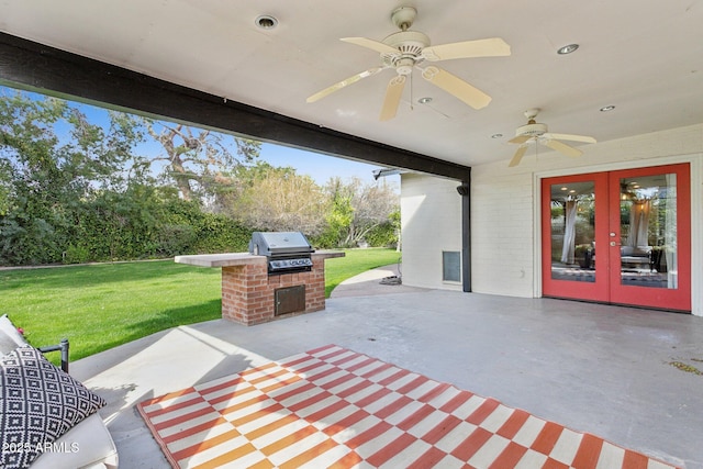 view of patio / terrace featuring french doors, a grill, an outdoor kitchen, and ceiling fan