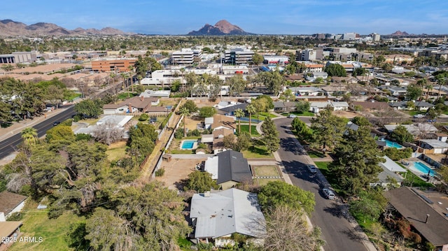 birds eye view of property featuring a mountain view
