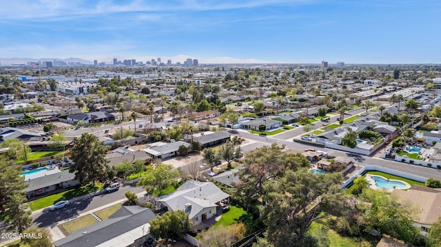 birds eye view of property featuring a view of city
