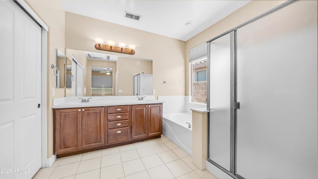 3439 W Darien Way, Phoenix, AZ 85086 - bathroom with a stall shower, a garden tub, double vanity, and tile patterned flooring