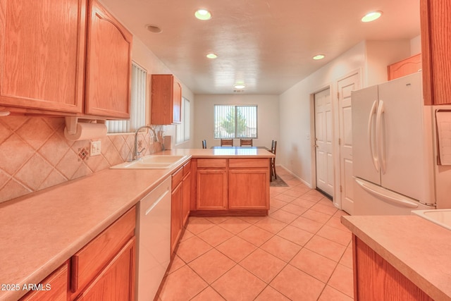 2386 Skyview Dr, Sierra Vista, AZ 85635 - kitchen with a sink, white appliances, light countertops, and recessed lighting