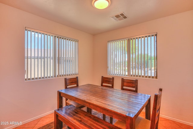 2386 Skyview Dr, Sierra Vista, AZ 85635 - dining space featuring light tile patterned floors and baseboards