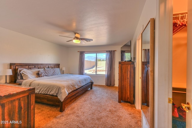 2386 Skyview Dr, Sierra Vista, AZ 85635 - bedroom with light carpet, a ceiling fan, and baseboards